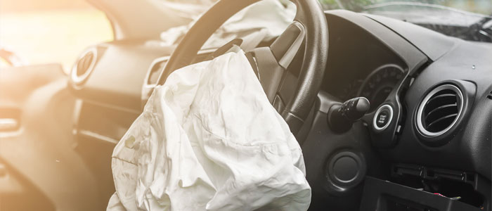 delfated airbag in car after an accident